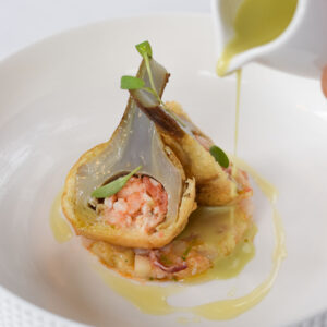 Les langoustines en ceviche Artichaut cuit et cru cabro dor